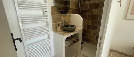 Shower, hair dryer, towels, soap