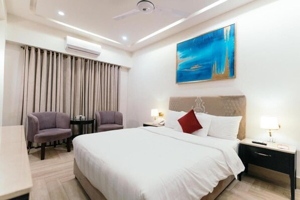 Chambre Deluxe Double ou avec lits jumeaux | Bureau, chambres insonorisées, fer et planche à repasser, Wi-Fi gratuit