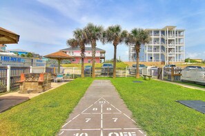Enjoy shuffleboard games and a fenced playground in our outdoor recreational space.