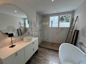 Shower, hair dryer, towels, soap