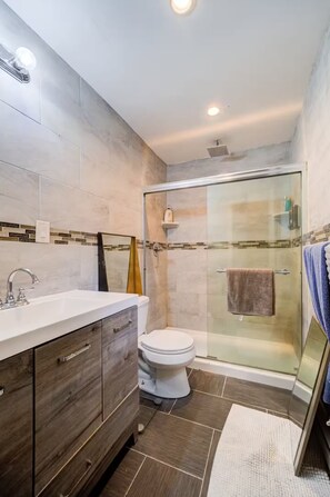 Shower, hair dryer, towels, soap