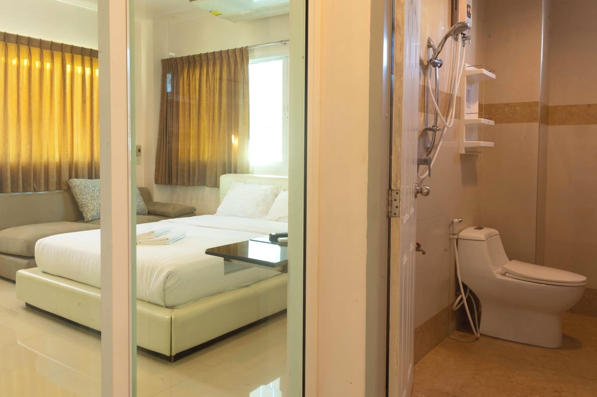 Shower, slippers, towels, soap