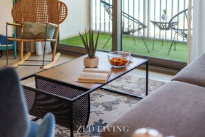 Deluxe Apartment, Sea View | Living area | 55-inch Smart TV with satellite channels - Panoramic Seaview Retreat | Premium Amenities (Dubai)