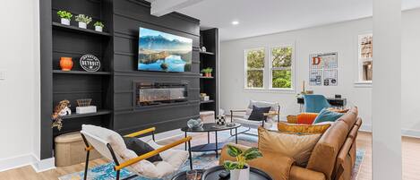 Smart TV, fireplace, books