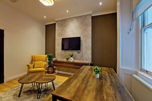 Apartment | Living area | 42-inch Smart TV with digital channels