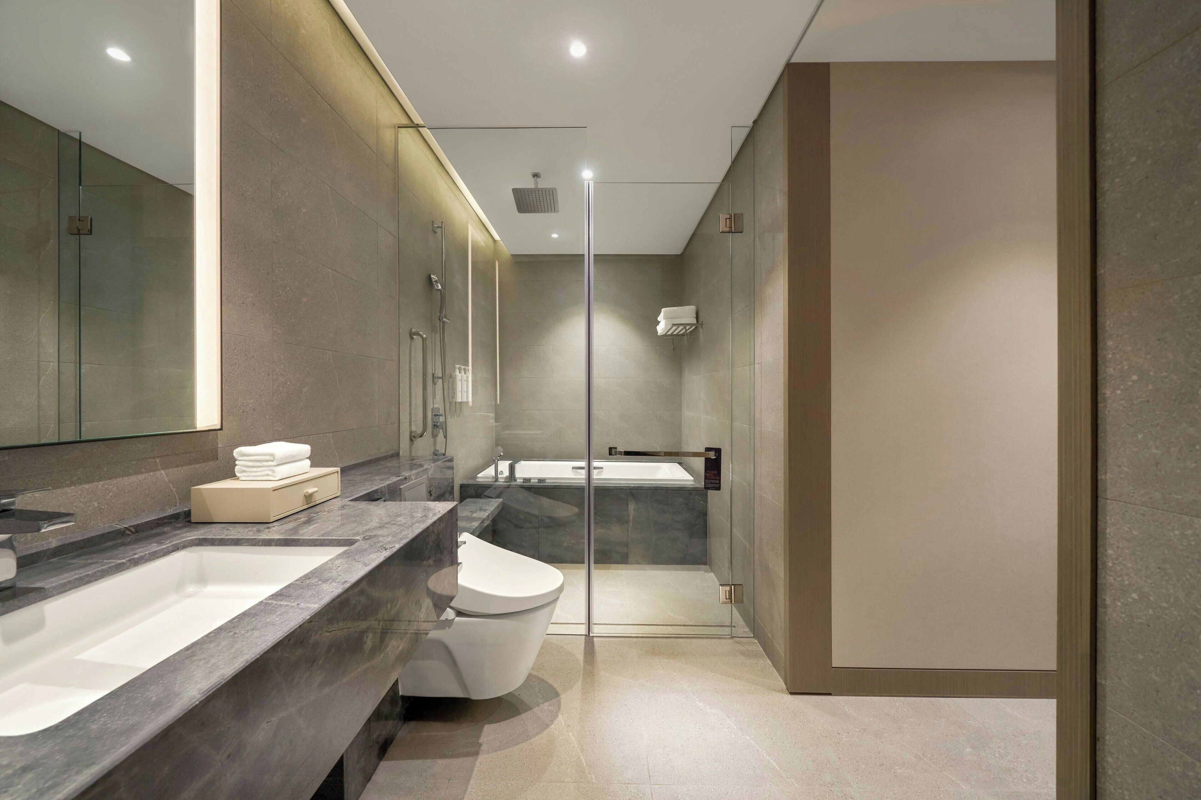 Hair dryer, bathrobes, towels, shampoo