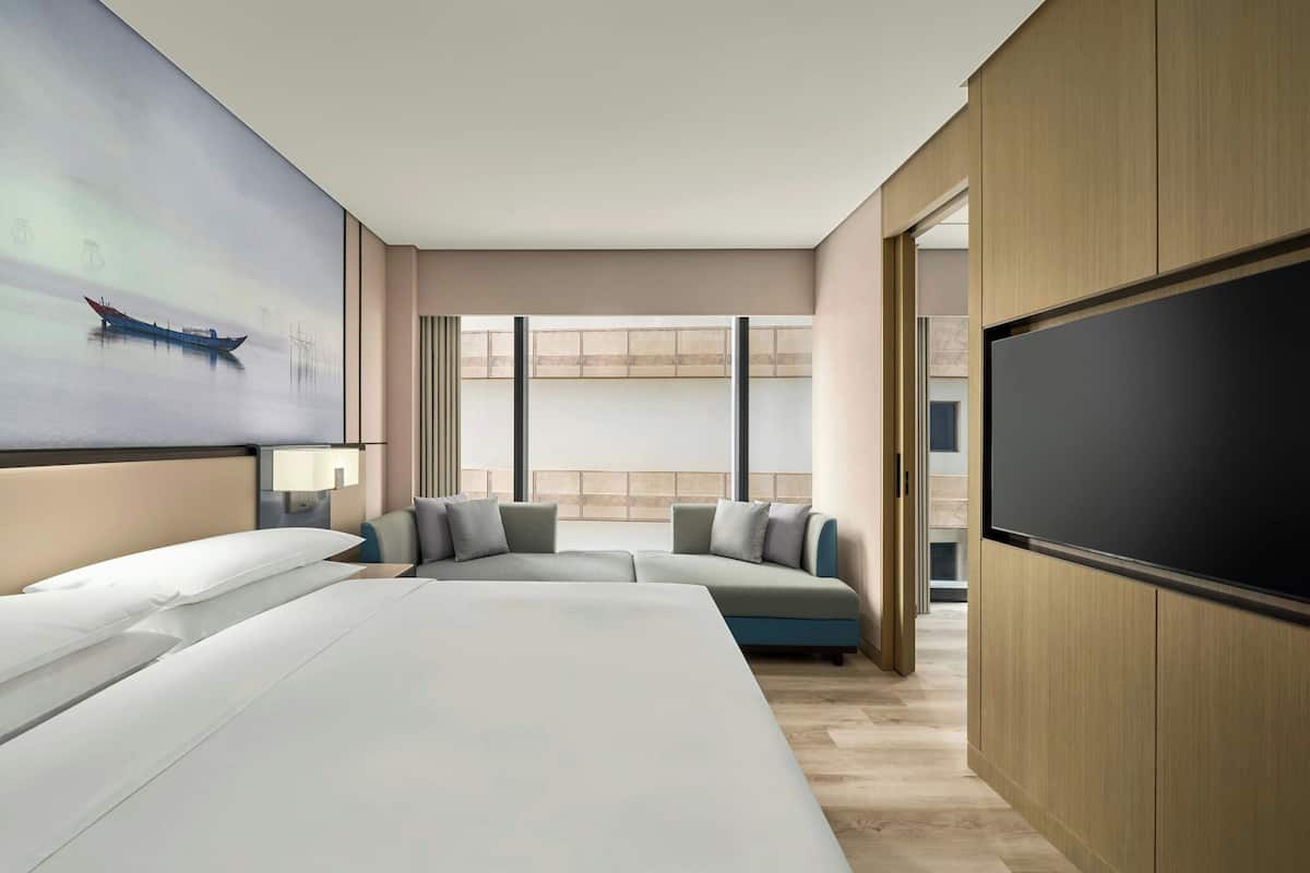Junior Suite, 1 Bedroom, City View | Premium bedding, minibar, desk, laptop workspace