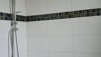 Hair dryer, bidet, towels, soap