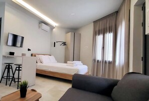 Estudio Deluxe | Tabla de planchar con plancha y wifi gratis 