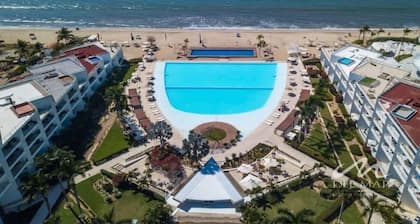 Waterfront condo w/ balcony & pool