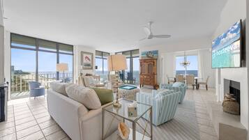 Deluxe Condo, 4 Bedrooms, Balcony, Beach View | Living room | TV