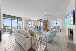 Deluxe Condo, 4 Bedrooms, Balcony, Beach View | Living room | TV