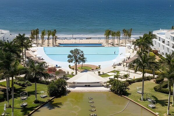 Pool - Aria Ocean 3BR condo w/ serene views & resort pool (Nuevo Vallarta)