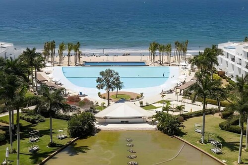 Waterfront condo w/ pool & parking