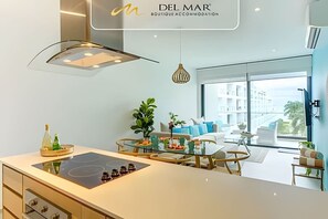 Fridge, microwave, coffee/tea maker, high chair