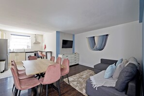 Apartment, 3 Bedrooms, Kitchen | Living area | Flat-screen TV
