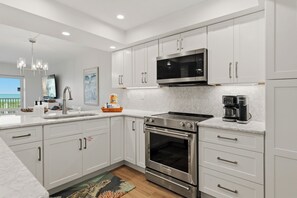 Fridge, microwave, oven, stovetop - Beachfront Bliss Awaits: Discover Your Newly Remodeled Sanibel Island Escape (Sanibel)