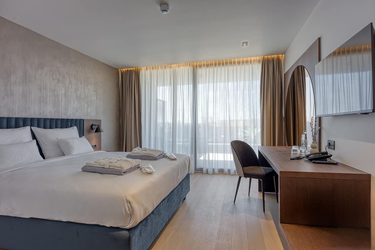 In-room safe, desk, laptop workspace, blackout curtains