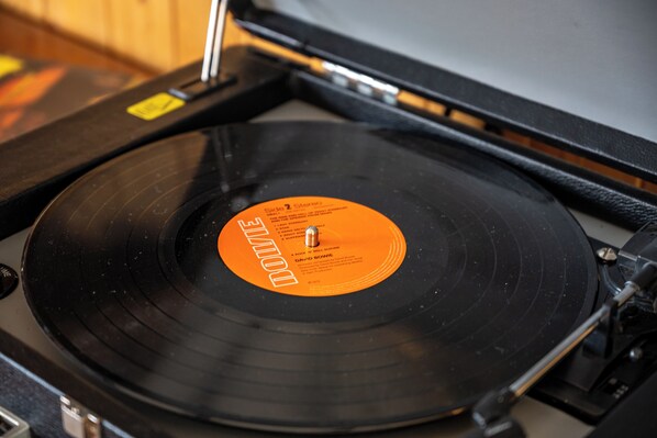 A vinyl record on a turntable.