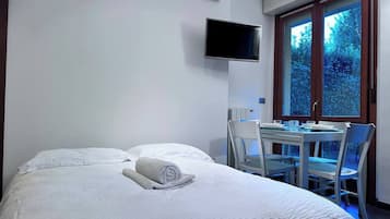 Een strijkplank/strijkijzer, wifi, beddengoed, rolstoeltoegankelijk