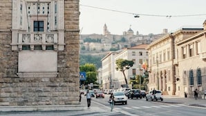 A stone monument with inscriptions and a classical architectural style.