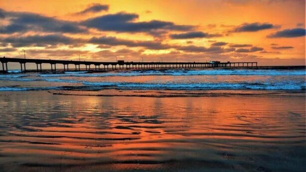 A pier extending into a body of water during sunset. - San Diego Surf Camp #4 - 1/2 Block to the Pacific! (San Diego)