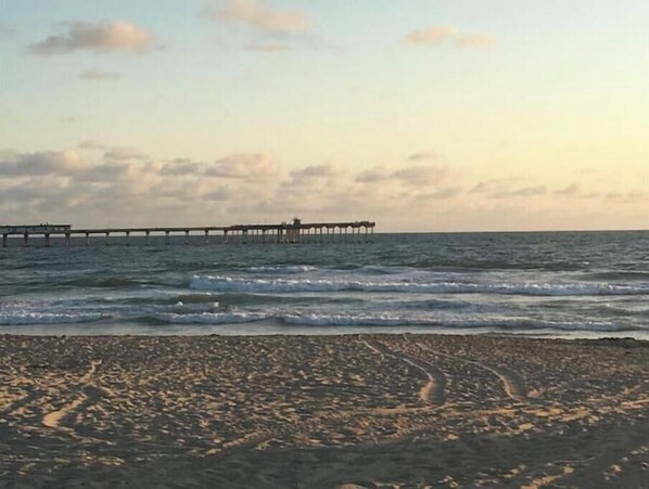 A beach with a pier extending into the water. - San Diego Surf Camp #4 - 1/2 Block to the Pacific! (San Diego)