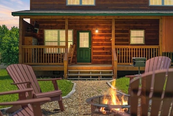 Relax by the fire pit and enjoy the evening air in our cozy cabin setting.