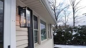 A house with a number 36 sign, a door with a handle, and a window with a black shutter. - Clean, Bright & Private WHOLE HOUSE 4 YOU. Safe, Centrally Located, Garage (New Britain)