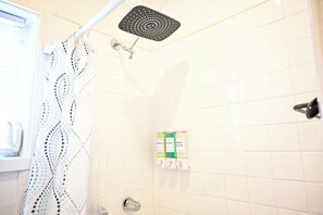 Shower, hair dryer, towels, soap