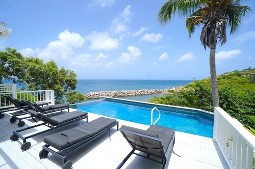Caribbean Dreaming in this spacious 5-bedroom villa in Frigate Bay with AC