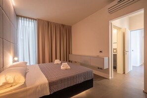 2 chambres, chambres insonorisées, fer et planche à repasser