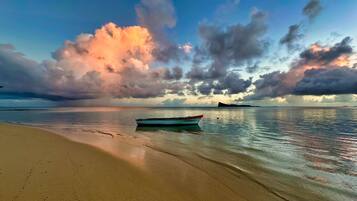 Beach nearby, sun loungers
