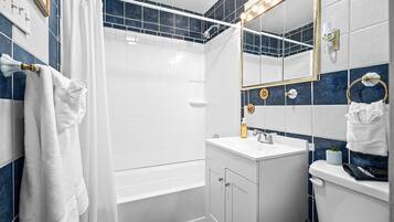 Hair dryer, towels, soap, shampoo
