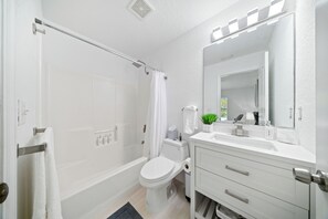 Hair dryer, towels, soap, toilet paper