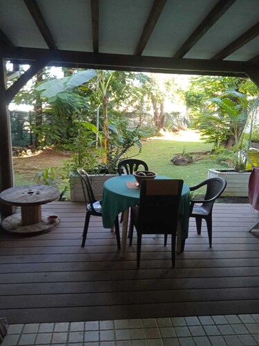 Hotel room with terrace, air-conditioning not overlooked, quiet, greenery and beach.