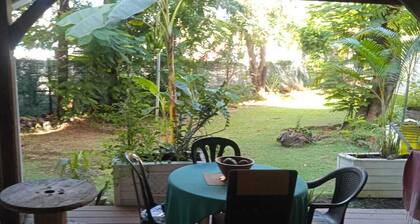 Hotel room with terrace, air-conditioning not overlooked, quiet, greenery and beach.