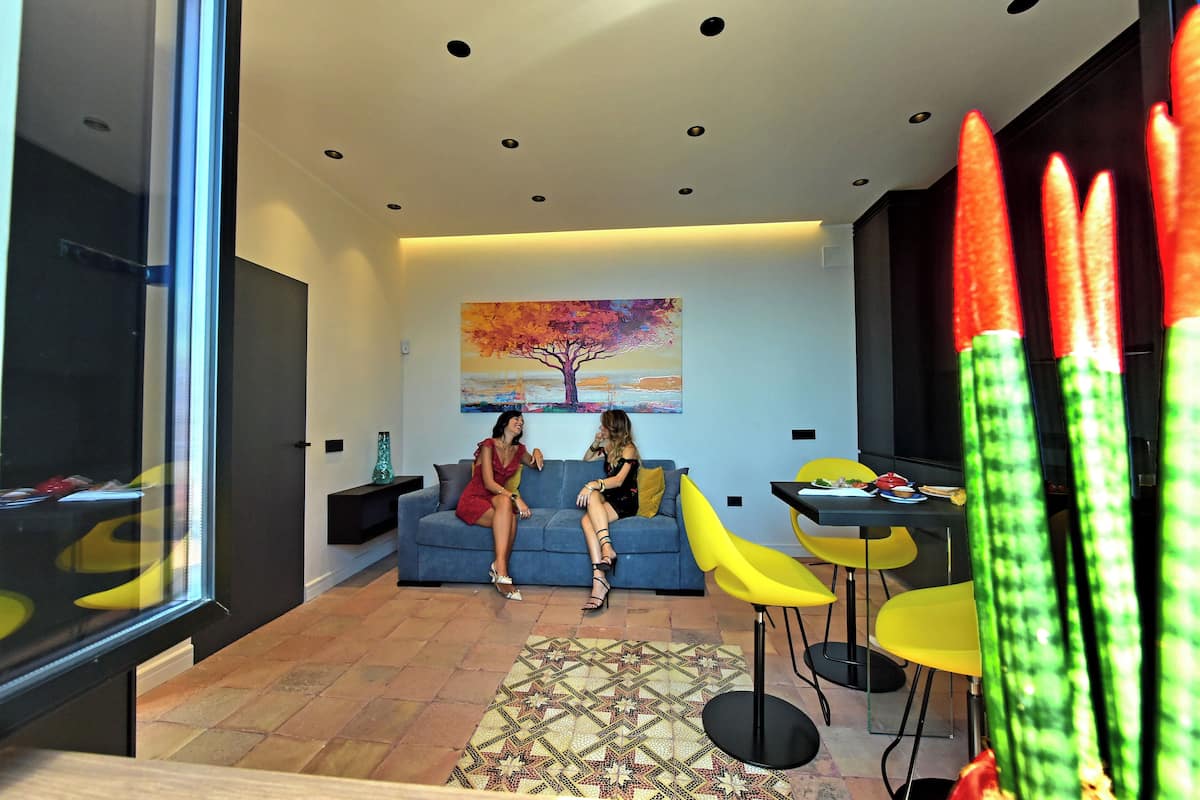 Deluxe-Apartment, Meerblick | Wohnzimmer