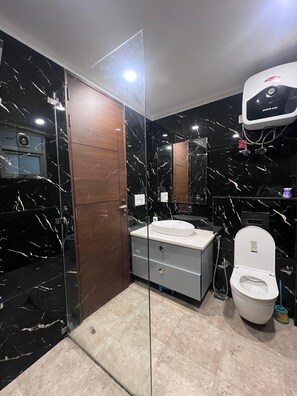 Shower, jetted tub, hair dryer, bidet