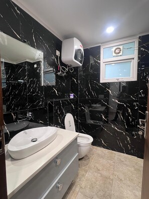 Shower, jetted tub, hair dryer, bidet