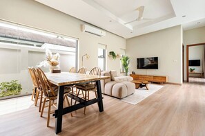 Standard Villa | Living room | 55-inch LED TV with digital channels - Baan Araya By Villacarte (Rawai)