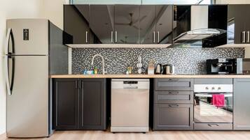 Standard Villa | Private kitchen | Full-size fridge, microwave, stovetop, toaster