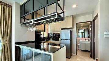 Family Apartment | Private kitchen | Fridge, microwave, stovetop, coffee/tea maker