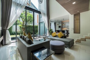 Villa, 2 chambres, patio | Coin séjour