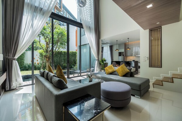 Villa, 2 Bedrooms, Patio | Living area | 55-inch LED TV with digital channels