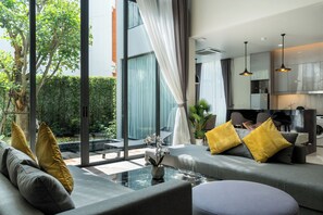 Villa, 2 chambres, patio | Coin séjour