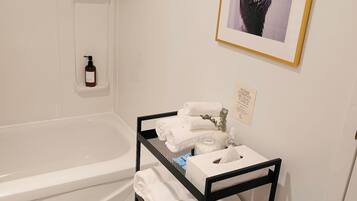 Hair dryer, towels, soap, shampoo