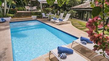 Outdoor pool, pool umbrellas, pool loungers