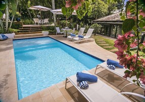 Outdoor pool, pool umbrellas, sun loungers