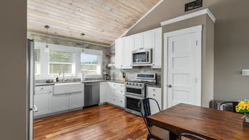 Fridge, microwave, coffee/tea maker, cookware/dishes/utensils